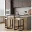 2 tabourets de bar en similicuir