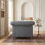 Fauteuil club capitonné