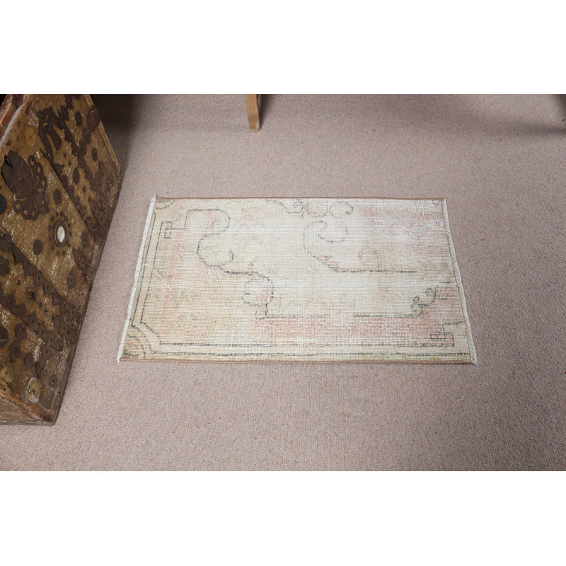 Experience The Elegance Of This Turkish Inspired Beige Wool Rug Perfect For Any Vintage Decor Theme