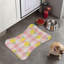 Tapis rose en forme d'os - 1 pièce-101344490