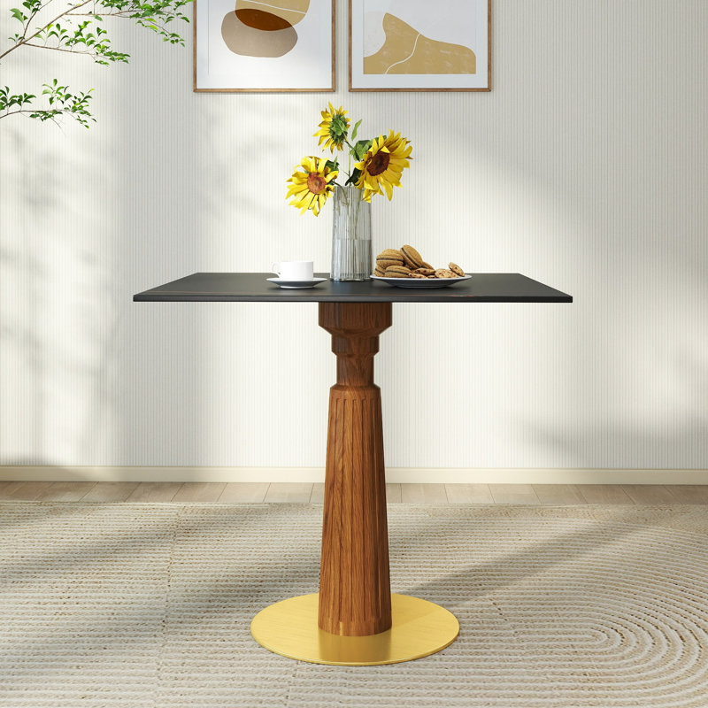 Table de salle à manger moderne en pierre frittée carrée avec pieds en bois et base dorée, parfaite pour les petits espaces et les repas pour 2 personnes