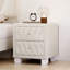 Élégante table de chevet en velours avec 2 tiroirs, poignées en cristal et capitonnage à boutons, beige