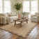 Ayanne Hand-Braided Scalloped Jute Brown Indoor Area Rug with Non-skid Backing