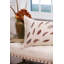 Coussin lombaire à motif de plumes