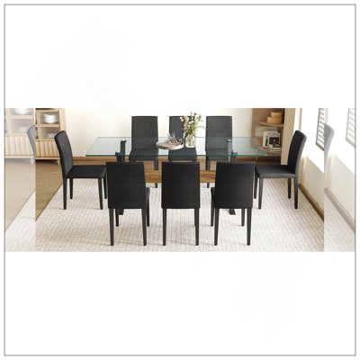 Ensemble de table et de chaises. Plateau de table en verre trempé de 79 po x 31,5 po avec pieds en métal noir en forme de X, traverse en panneau de fibres à densité moyenne à grain de bois texturé.