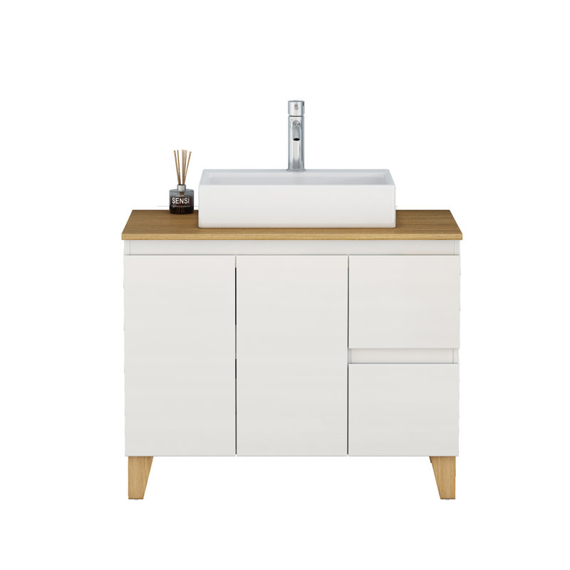 Ensemble de meuble-lavabo moderne avec lavabo, portes et grand tiroir, système à clous doux, conception sans poignée, plateau et pieds en bois massif naturel, lavabo rond en céramique sur le comptoir, blanc brillant