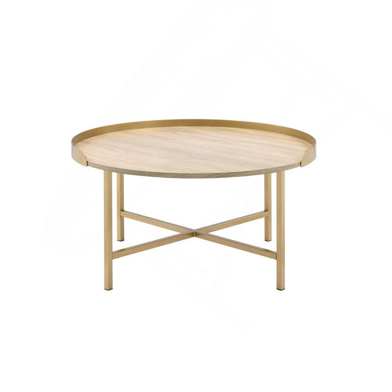 Table basse finition chêne et or.
