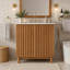 Meuble-lavabo traditionnel de 76 cm (29,9 pouces) avec lavabo en céramique, pieds en bois et tablette réglable en forme de U pour un rangement optimal.