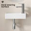 Lavabo de salle de bain mural en céramique avec robinet et bonde, conception peu encombrante pour les petits espaces