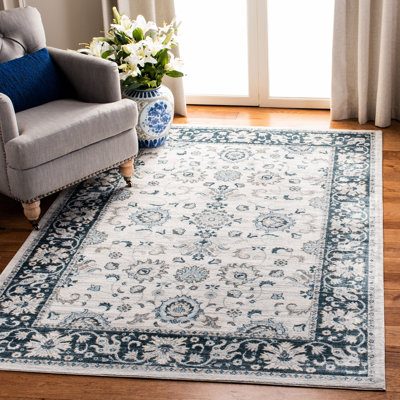 Swinehart Oriental Hand Woven Area Rug