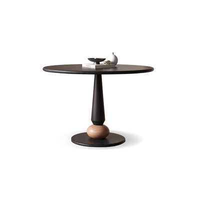 Table de salle à manger ronde noire en bois massif