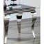 Table de bout de style classique avec structure en acier inoxydable et plateau en verre noir pour les pieds en argent trempé transitionnel du salon