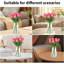 Vraies tulipes artificielles dans un vase en verre avec de l'eau artificielle, décor de table rose rouge-601911223