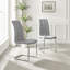 Lenworth Chrome and Glass Rectangular Dining Table Set with 4 Modern Faux Leather Chairs-337263341