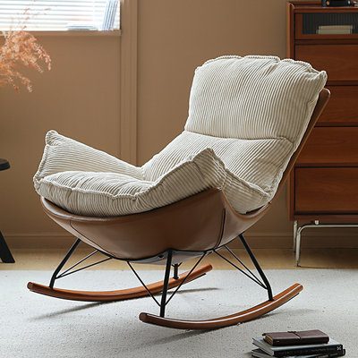 Rocking chair with egg-shaped armrests