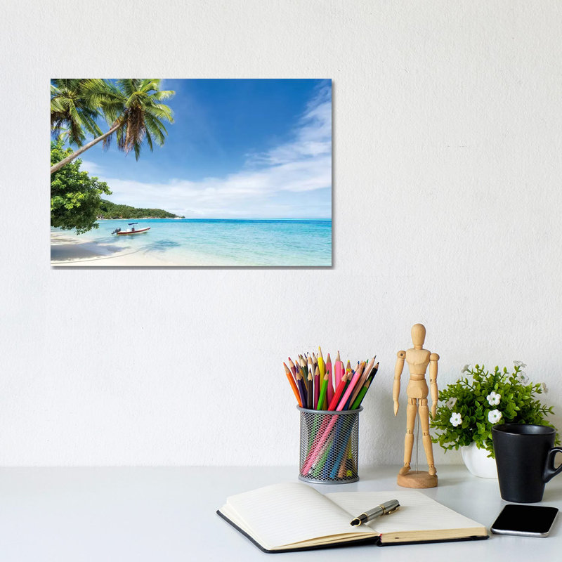 Idyllic Beach With Palm Trees And Boat On Bora Bora by Jan Becke - Wrapped Canvas Print, 20.32cm H x 30.48cm W