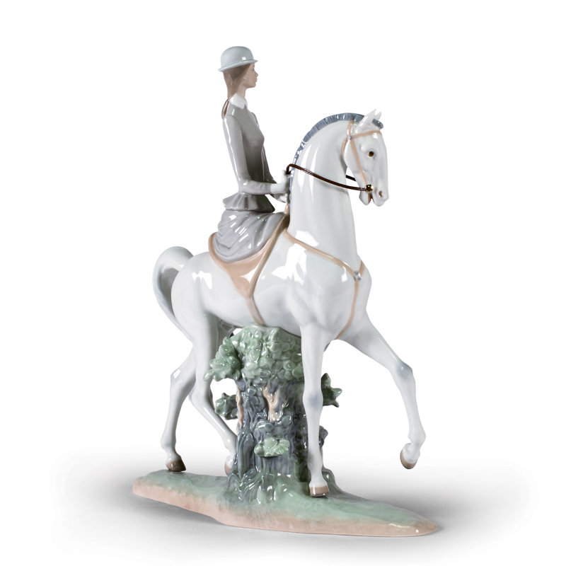 Woman on Horse Figurine