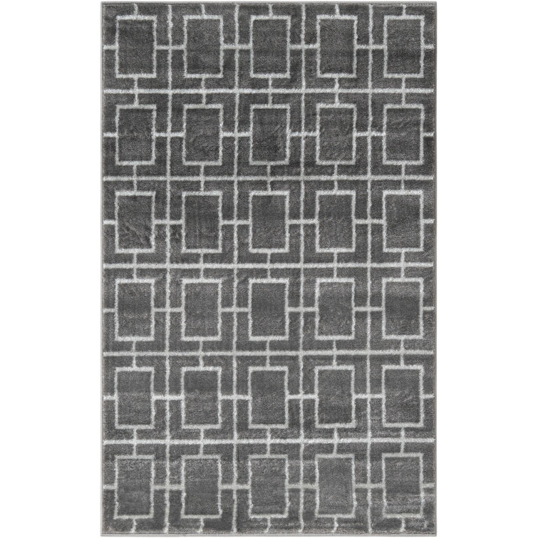 Tapis gris argenté à motif géométrique glam
