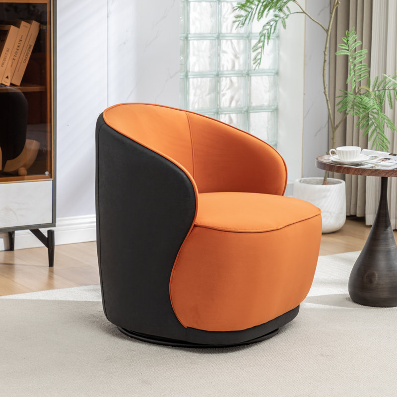 Fauteuil demi-tonneau pivotant en velours Stith, Velours noir / orange