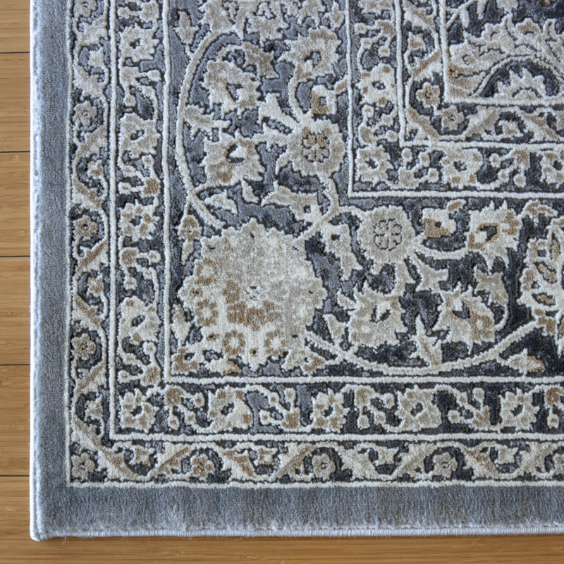 Tapis argent / gris à double bordure à motif floral de style oriental traditionnel Evans Laeh
