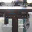 Adjustable Height L-Shaped Stainless Steel Standing Desk with Built-In Electrical Outlet