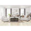Fauteuil beige rembourré incliné