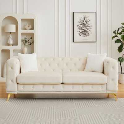 [Video] Classic modern sofa: 82.5-inch Chesterfield-style sofa with tufted detailing and luxurious velvet upholstery, featuring 2 throw pillows and metal legs,beige