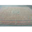 Grand tapis turc avec motif floral rétro dans des couleurs pastel douces et élégant beige et bleu pour le décor du salon