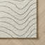 Tapis à motif abstrait beige / crème 8 pi x 11 pi (7 pi 10 po x 10 pi 10 po) Rahil de Tapis Branch-384399641