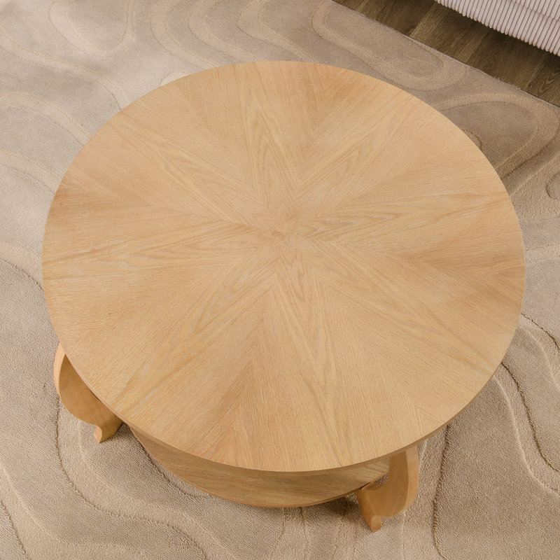 Table basse moderne en forme de tambour avec plateau en grain de bois et pieds réglables