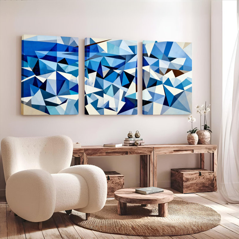 Ensemble de 3 tableaux abstraits géométriques à motifs de triangles bleus sur toile tendue, H 18 po x l 36 po