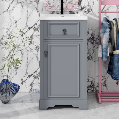 Meuble-lavabo de 20 pouces avec lavabo en céramique, porte à fermeture douce, tablettes réglables et rangement au-dessus de la porte pour les petites salles de bain