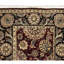 Manchuria Wool Oriental Area Rug in Black/Wine