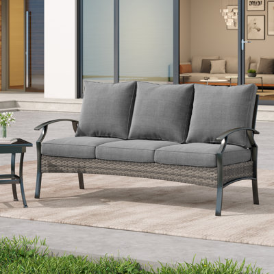 Charron Metal 3-person Patio Outdoor Sofa with Cushions and Wicker Decor by Winston Porter