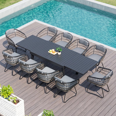 Warran 10 - Person 106’’L Patio Dining Set with Gray Cushions and Extendable Aluminum Table