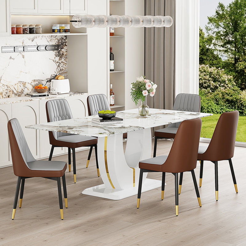 Ensemble de table de salle à manger rectangulaire de 71 po pour 6 personnes avec un plateau en faux marbre et des chaises en cuir de polyuréthane. Cet ensemble de salle à manger 7 pièces convient aux maisons, aux restaurants et aux espaces de bureau.