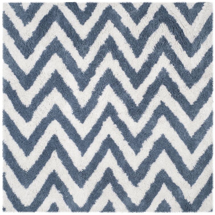 Delane Handmade Tufted Ivory/Blue Area Rug