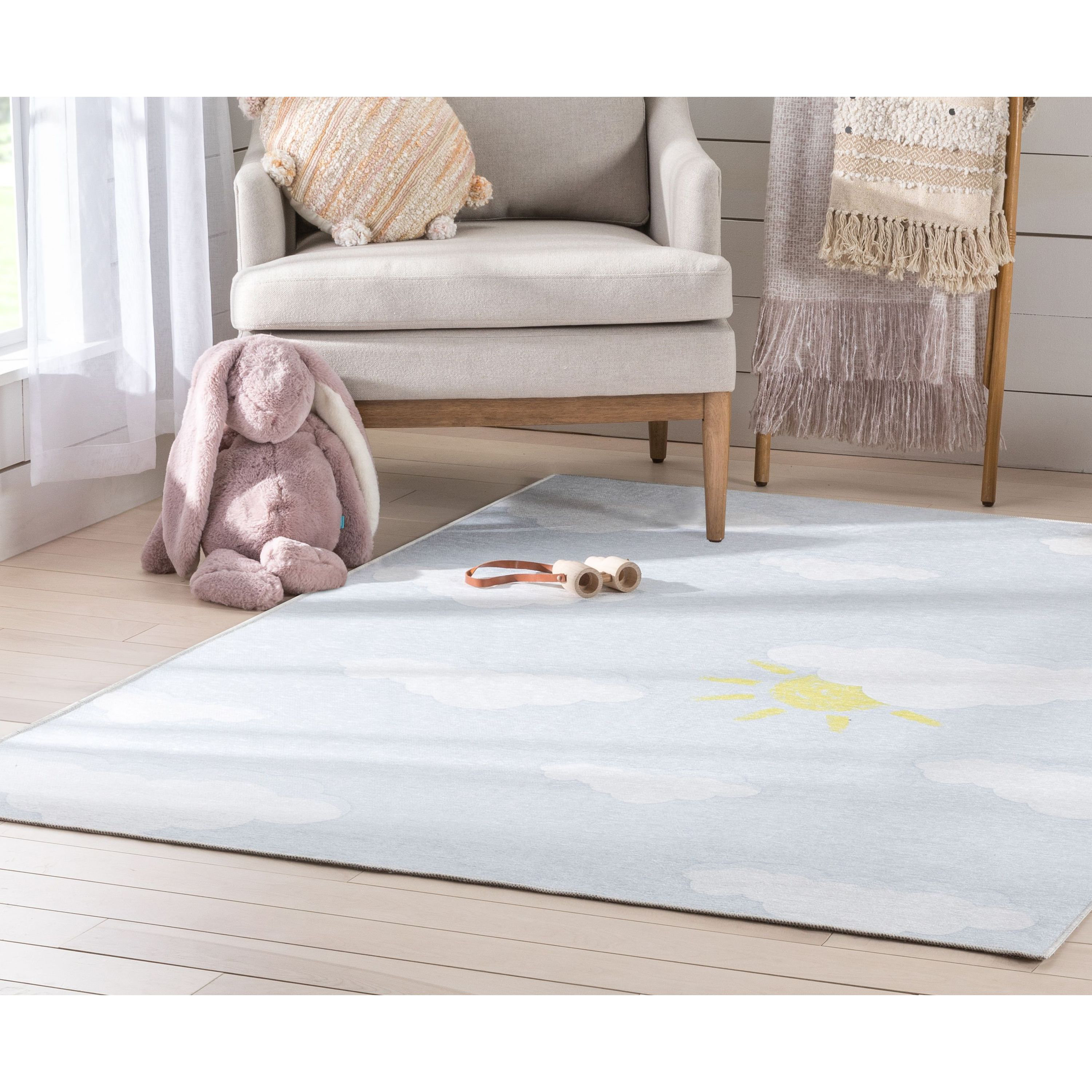 https://assets.wfcdn.com/im/88532539/compr-r85/1997/199709059/apollo-well-woven-kids-rugs-cloud-9-sun-modern-gray-light-blue-area-rug.jpg