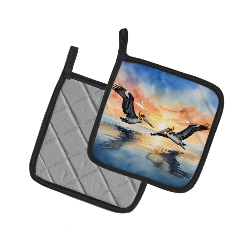 Pélicans volant de porte-casseroles