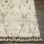Tapis crème / gris / noir en laine noué à la main Clive-95591321