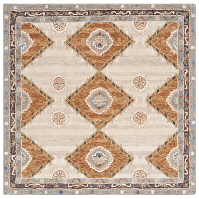Arkadijus Southwestern Handmade Tufted Area Rug in Brown / Blue