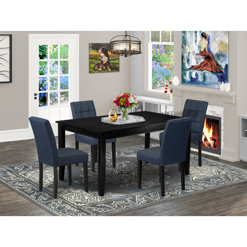 L'ensemble de table de salle à manger 5 pièces comprend une table de salle à manger et 4 chaises de cuisine Parson en polyester bleu marine foncé avec dossier élégant - finition noire