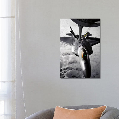 A KC-135 Stratotanker Refuels a F-22 Raptor 1 Piece Wrapped Canvas Wall Art