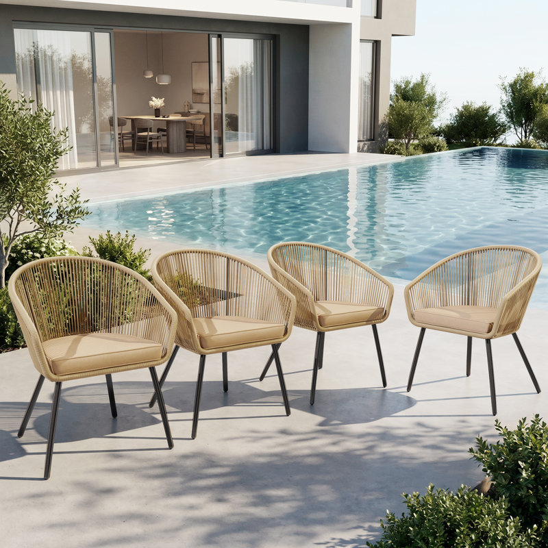 Chaises de salle à manger d'extérieur en rotin avec coussins