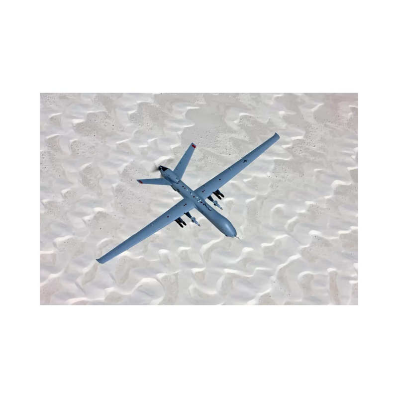 An MQ-9 Reaper Flies A Training Mission Over Southern New Mexico by HIGH-G Productions - Wrapped Canvas Print