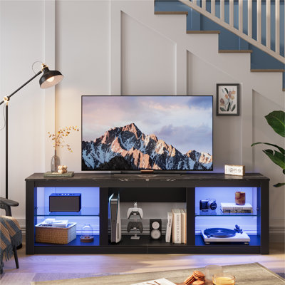 Kruszewski 70 In. TV Stand Fits TVs Up To 75 In. with LED Lights Glass Shelves and Open Storage