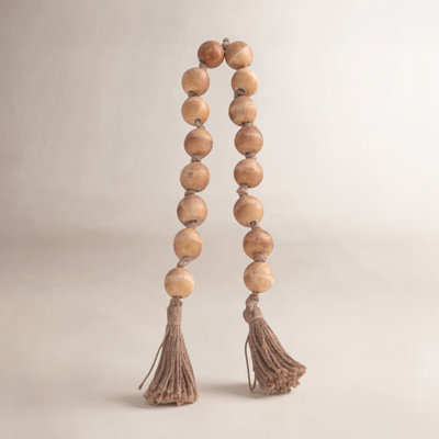 Perles décoratives fabriquées à la main en bois de manguier et en jute avec des accents tissés
