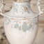 Vase rétro en métal avec poignées, vase antique blanc et bleu