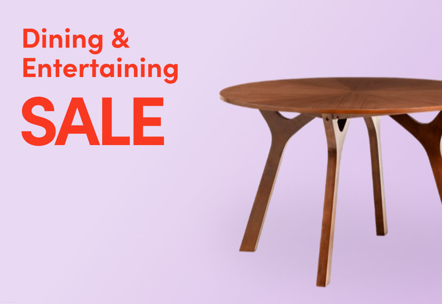 Dining & Entertaining Sale promotional banner featuring a round wooden dining table on a lavender background