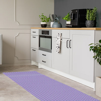 Tapis bleu à rayures losanges